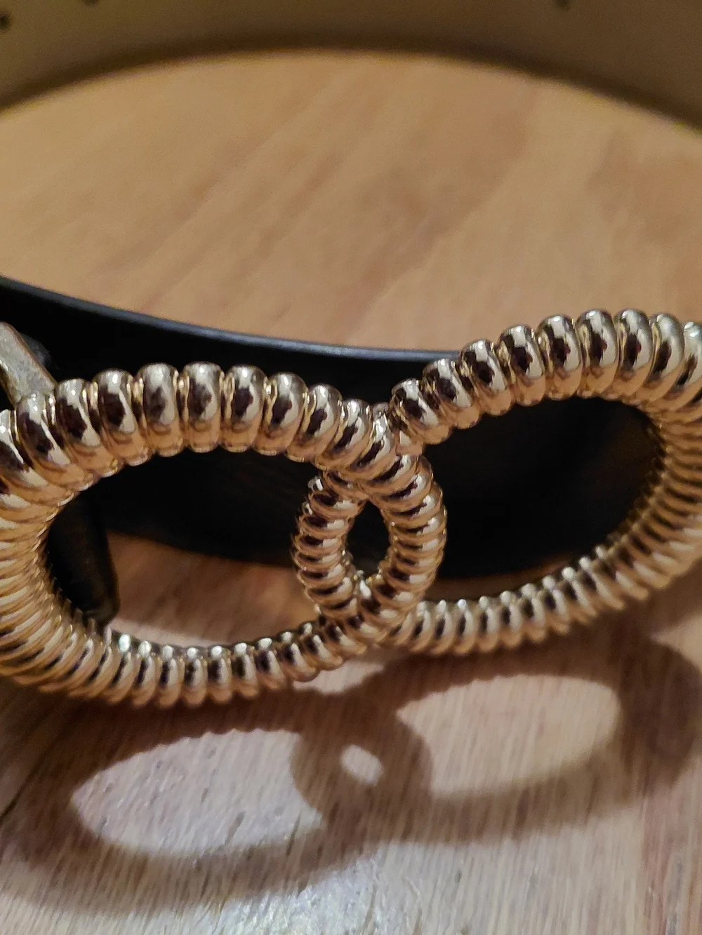 Vince Camuto Black Belt with Gold Twisted Ring Detail